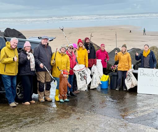 Volunteers gather at Westward Ho! beach as part of Earth Action North Devon’s Day of Action, helping to remove litter and plastic pollution from the coastline