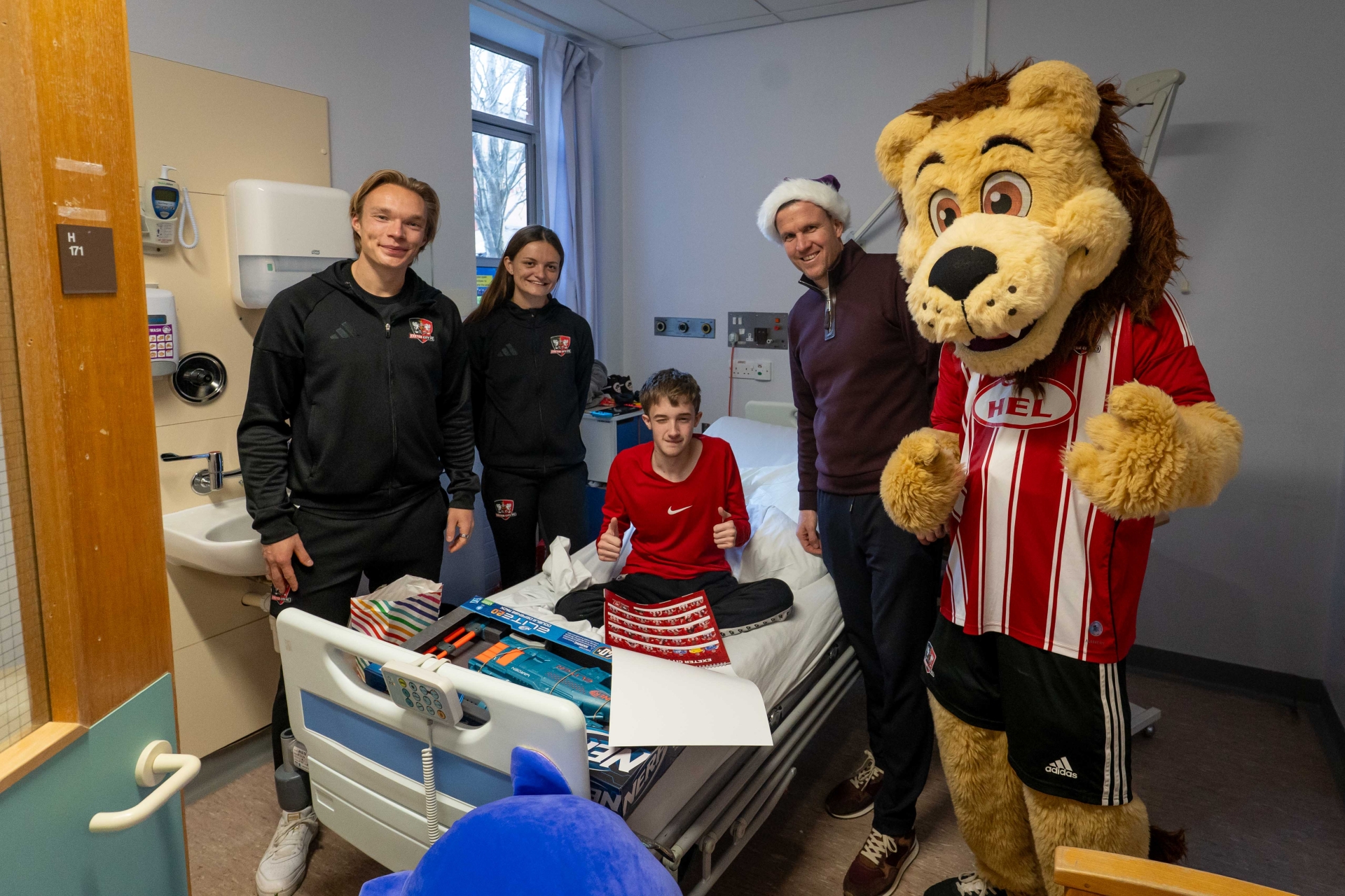 Exeter City FC players bring Christmas cheer to young patients at Royal ...