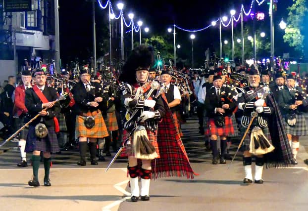 The Bideford Massed Pipes and Drums parade along the quay is a sight to behold – and hear! Credit: Graham Hobbs