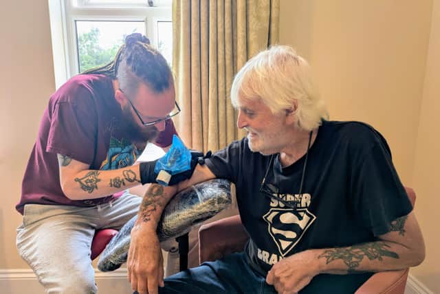 “However, after all this time, I’d got bored of staring at the same ones on my arms every day. These new tattoos are all for a reason and that includes getting the Kenwith Castle care home logo as it’s in keeping with my journey, especially as the team are looking after me so well. My family, friends and the care home team are all so important to me.”