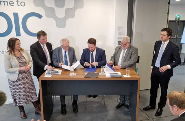 The devolution deal proposals are unveiled in Paignton by Levelling Up Minister Jacob Young, flanked by county council leader John Hart and Torbay Council leader Dave Thomas. Credit: LDRS