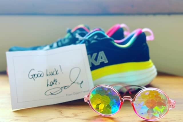 The sunglasses, which have a quirky kaleidoscope lens, were a gift from Dawn after Andy shared details of his upcoming treadmill run on social media.
