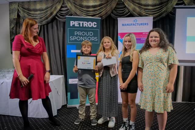 Siobhan Tindal of Krempel presented the prizes to children from runner-up school, Lynton Primary who managed the strongest tower which held 12 eggs, followed by the winners from Southmead Primary School who had created a structure standing 420mm high.