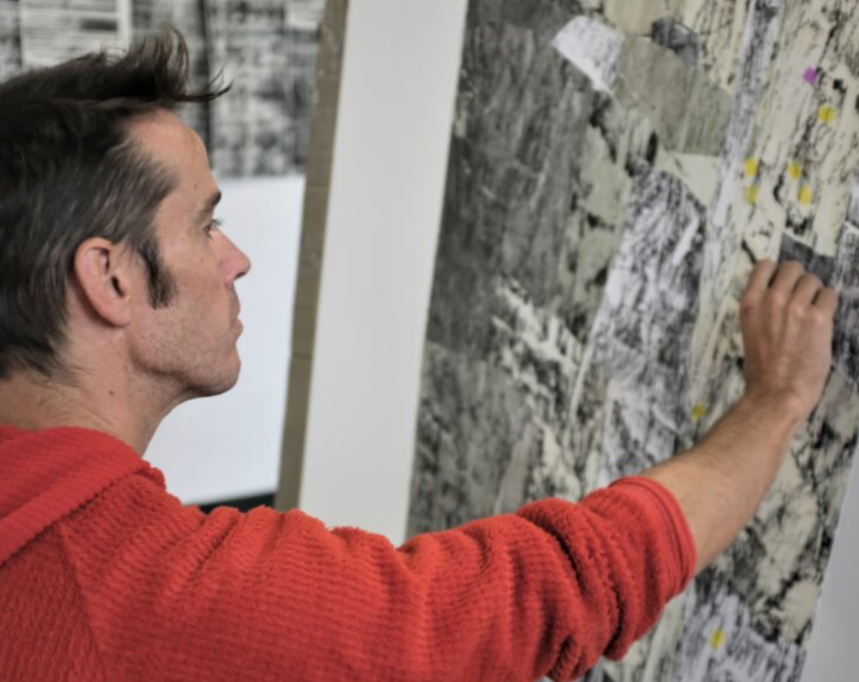 Tom Randall placing the pegs on a slab print.