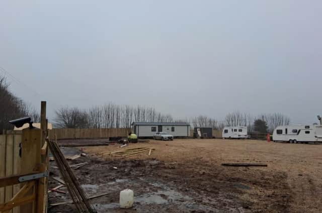 The site at Charles, where caravans had been placed and which was given planning permission in May, now overturned by the High Court. 
