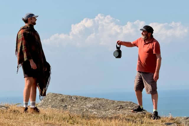 During a daytime rehearsal at Valley of Rocks, ‘The Visitor’ played by Ben Fensome, meets The Signalman, played by Gerald Dickens, great great grandson of Charles Dickens.