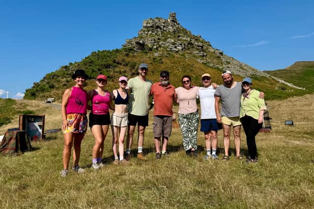 The Pleasure Dome Theatre Company cast and crew of The Signalman, a retelling of the Charles Dickens classic ghost story, on location during rehearsal at Valley of Rocks, Lynton.