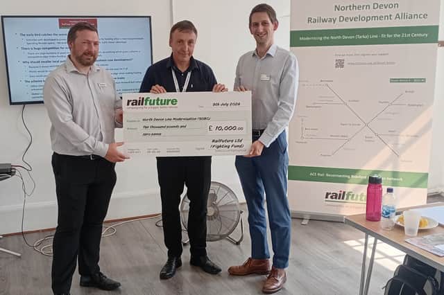 L–R: David Whiteway (GWR), Tim Steer (Railfuture) and Andrew Robinson (Network Rail), pictured with the Railfuture cheque