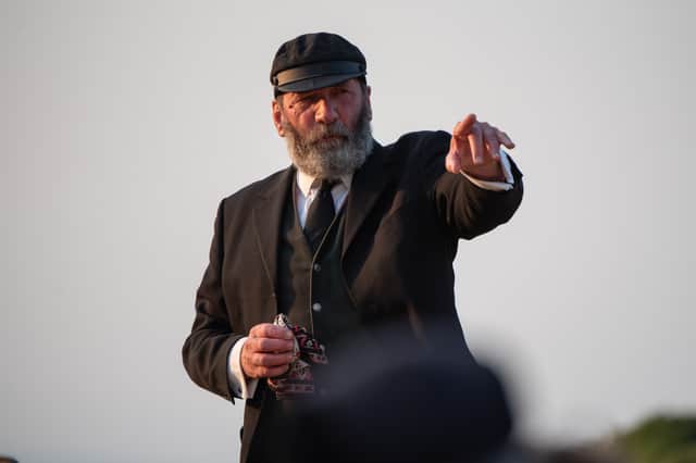 Gerald Dickens as The Signalman in the Pleasure Dome Theatre production of the Charles Dickens ghost story, now playing outdoors at Valley of Rocks, Lynton.