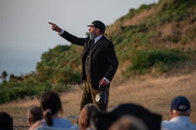 Gerald Dickens as The Signalman in the Pleasure Dome Theatre production of the Charles Dickens ghost story, now playing outdoors at Valley of Rocks, Lynton.