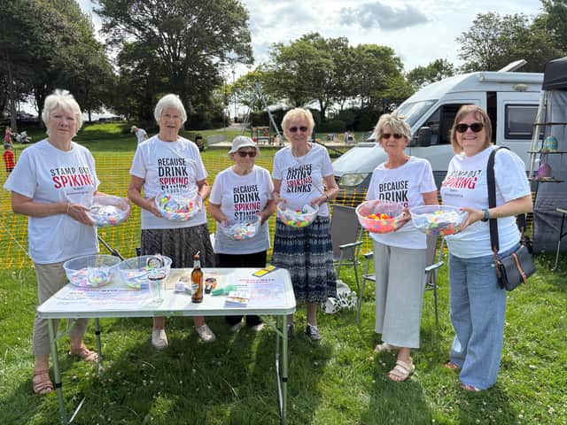 Barnstaple Soroptimists often attend local festivals to hand out free Spikeys and StopTopps that help to prevent drink spiking. Credit: Barnstaple Soroptimists