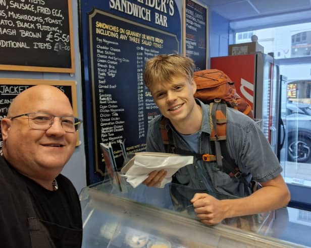 Alexander’s Sandwich Bar owner Nik Edwards with EastEnders star Pierre Counihan-Moullier, who plays Oscar Branning in the hit soap. Credit: Nik Edwards 