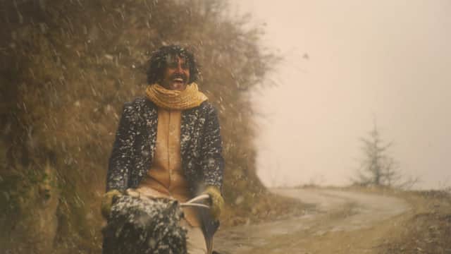 Chirag Benedict Lobo as PK in The Cycle of Love – the real PK did actually cycle from India to Sweden! Credit: Dogwoof