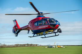 A Devon Air Ambulance helicopter. The charity needs £4.9 million to complete its new headquarters at Exeter Airport  