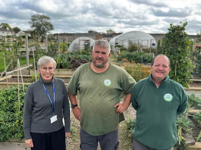 Michaela Masterson, Mark King and Lee Smith at Pilton Community Farm.