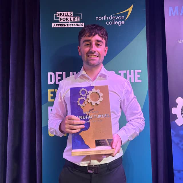 Liam Smith, graduate systems engineer at SEA, with his Outstanding Individual of the Year Award received at the North Devon Manufacturing Awards.