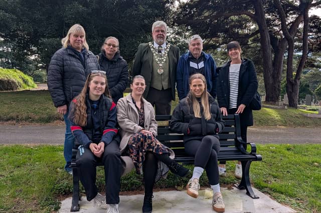 Gathered to unveil the bench dedicated to former Ilfracombe mayor and councillor Mike Edmunds are Mike’s stepdaughter Lorraine, Councillor Terry Elliott, Ilfracombe Mayor Mark Fay, Ray, Mike’s stepdaughter Sam and his granddaughters Lucy, Natasha and Caitlin.