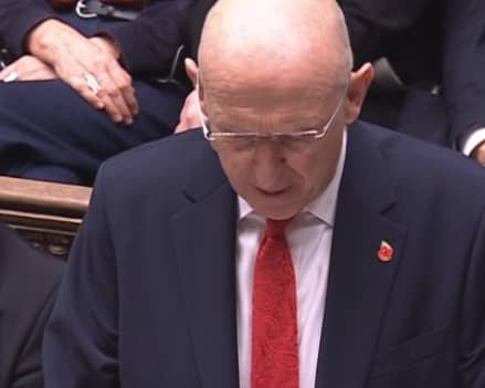 Chancellor John Healey delivering his Budget in Parliament