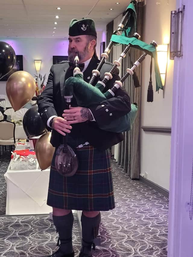 A piper opens proceedings for The Veterans Charity Masquerade Ball.