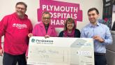 Persimmon presenting the cheque Plymouth Hospitals Charity (Image- Persimmon)