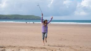 Woolacombe beachgoers swap boards for silent disco cleanups
