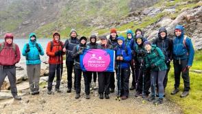 Devon police scale Welsh peaks for charity amid tough conditions
