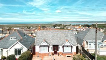 Enjoy sea views at Windmill Lane in Niortham