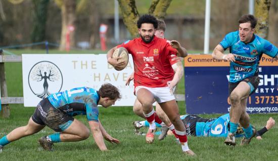 Cameron Grizzle-Johnson on his way to scoring Barnstaple's second try. Pic from Bob Collins