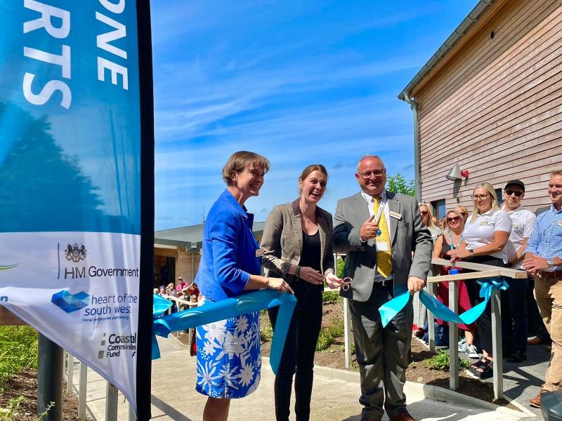 Selaine Saxby MP (left) and NDC CounciL Leader Ian Roome (right) cutting ribbon at Watersports Centre - Credit: NDC