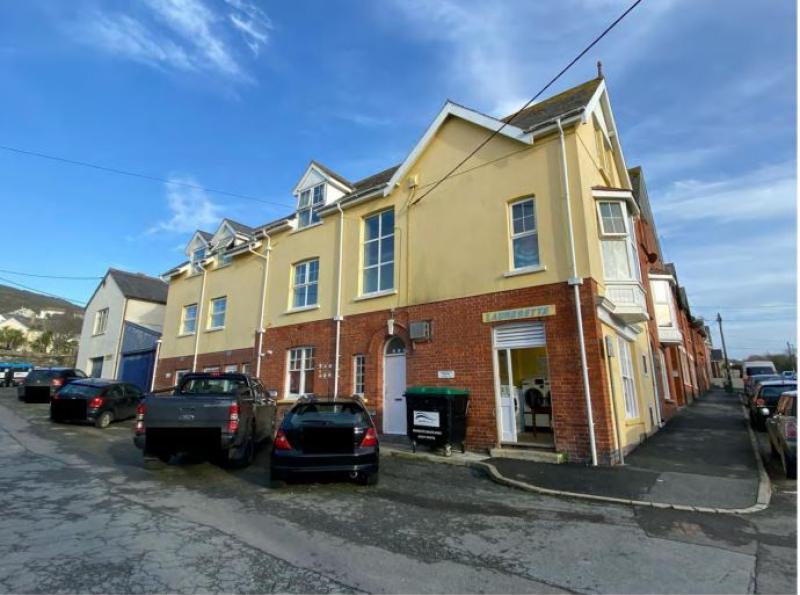 The house currently houses a launderette, an office and 14 bedrooms