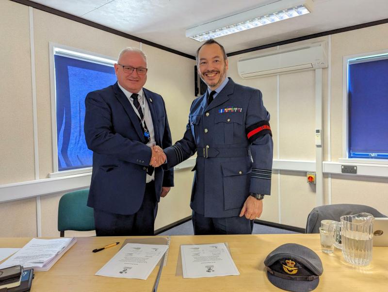 Leader of North Devon Council, Councillor Ian Roome, and Wing Commander Alex Drake sign North Devon Council's Armed Forces Covenant - Credit: NDC