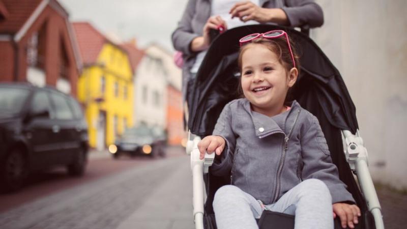 A file image of a child in a pushchair - Credit: DCC