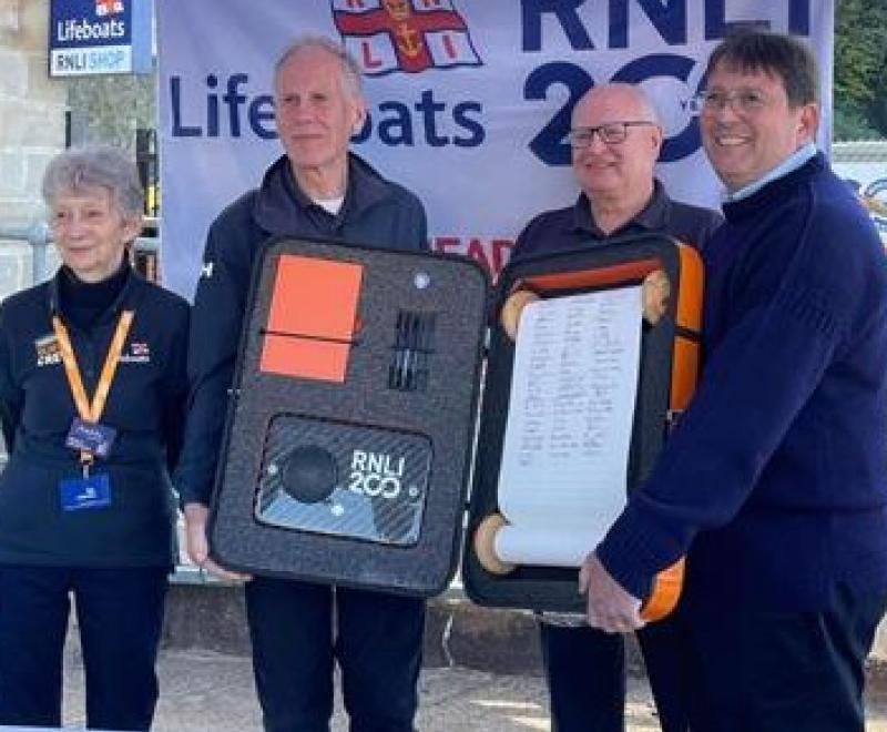 RNLI Ilfracombe delivers commemorative scroll