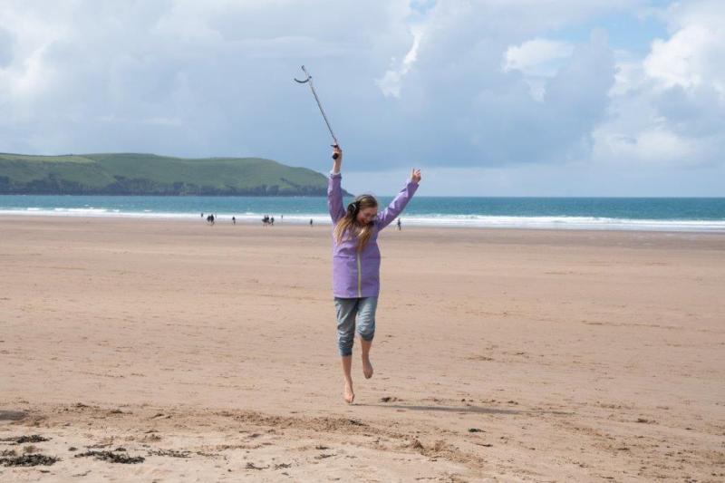 Woolacombe beachgoers swap boards for silent disco cleanups