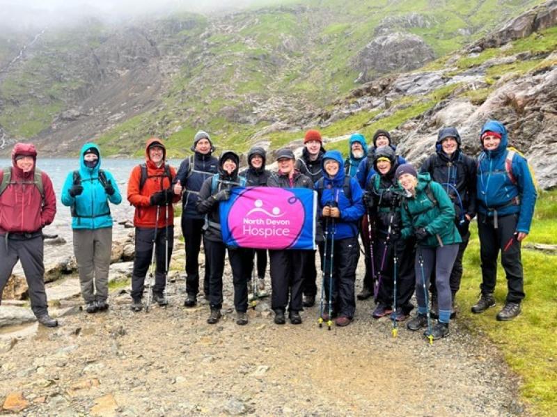 Devon police scale Welsh peaks for charity amid tough conditions