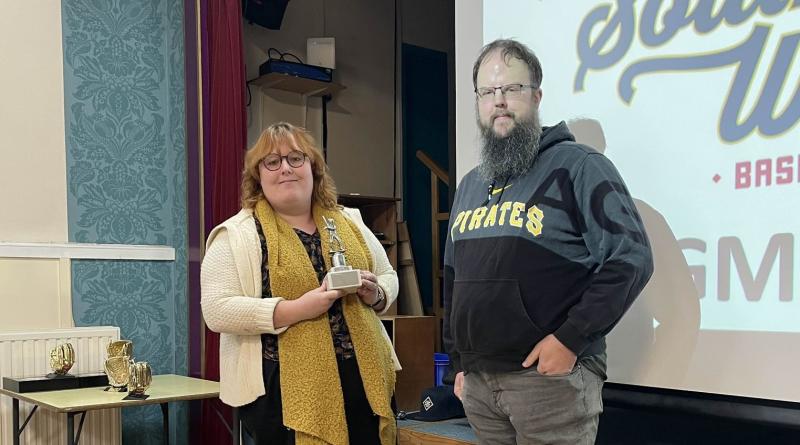 Jess Cooper receives her Player of the Year Award from League official Jason Toms Photo Artie Herbert