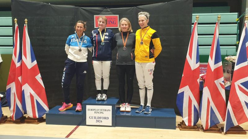 Guildford International Becky Ragland (in yellow) bronze photo @ Gillian Azajghan