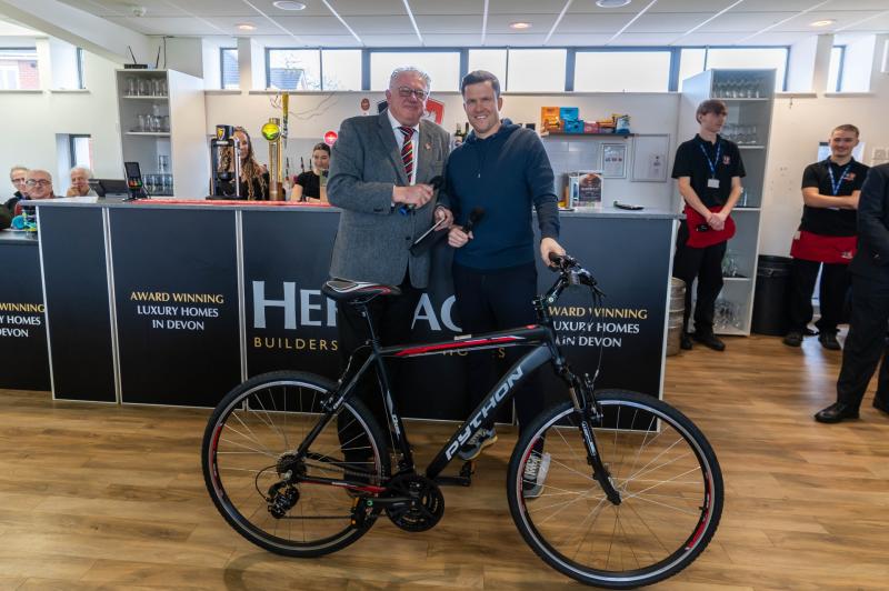 Julian Tagg presents Gary Caldwell with his new bike