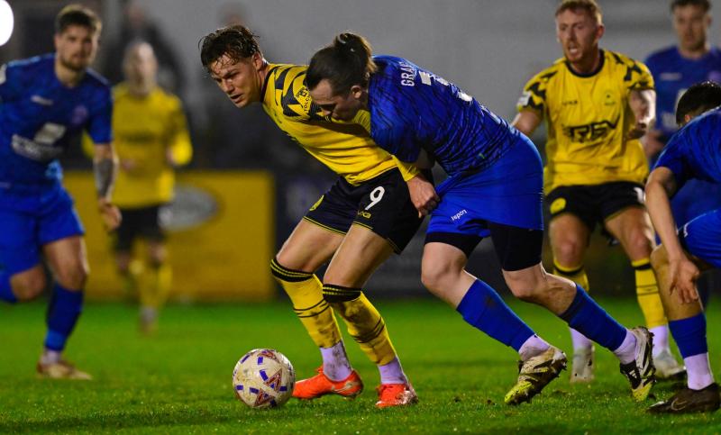 Cody Cooke battling for the ball at Chippenham. Pic from PPAUK
