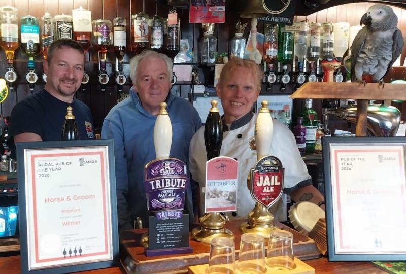 Photo: Landlord Olly, Plymouth CAMRA Bob, Landlady Dawn & Blaze