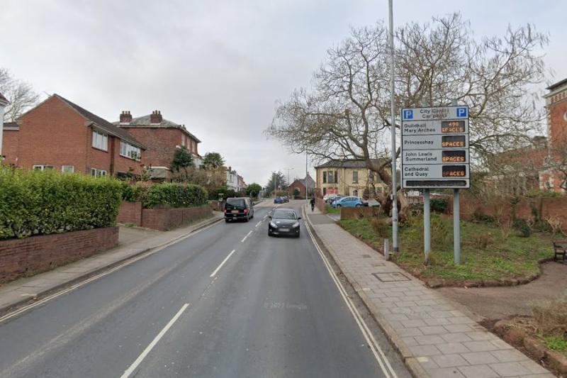Car collides with wall in Exeter blocking road