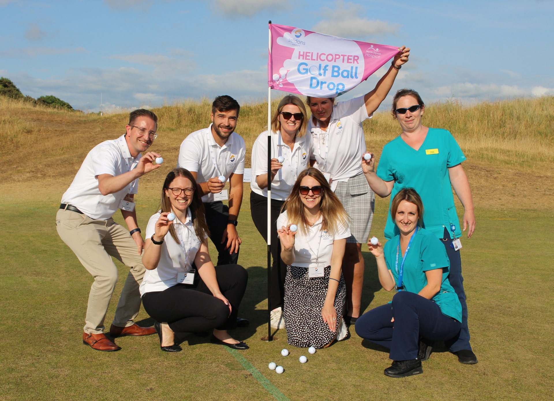 The team from Seldons – sponsors of the Helicopter Golf Ball Drop – with hospice nurses Angie and Briony - Credit: NDH