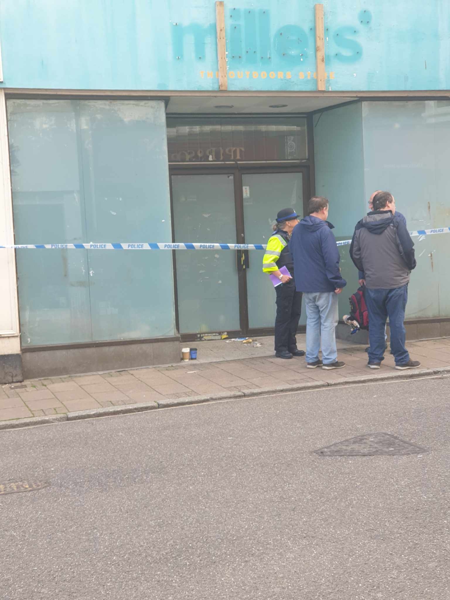 Police cordoned off the former Millets shop on Barnstaple High Street - Credit: Submitted