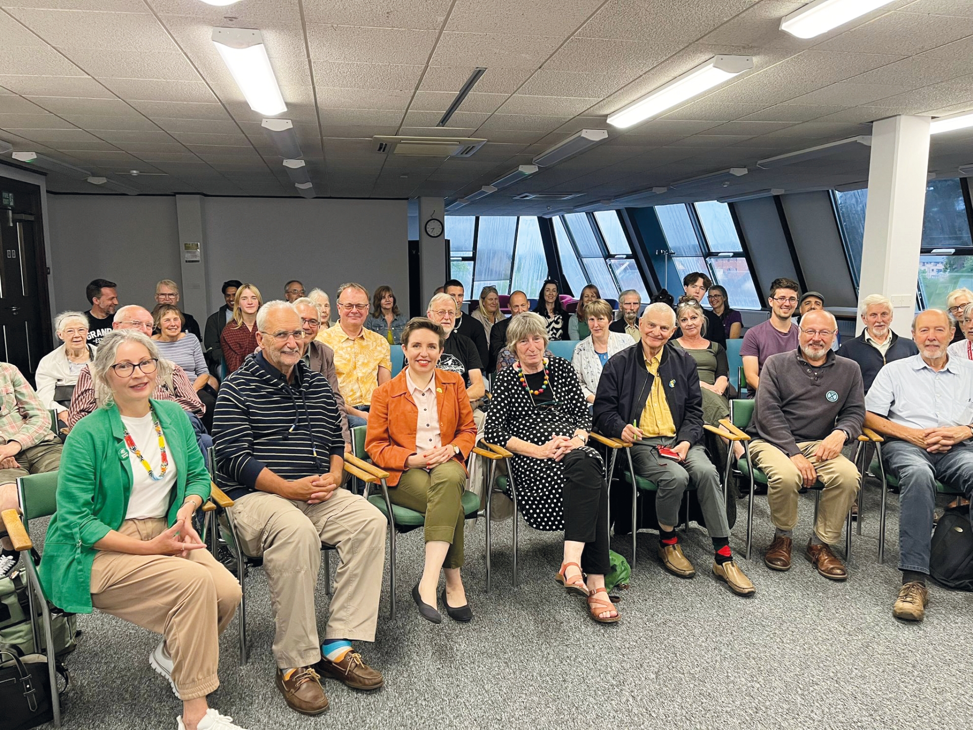 Carla Denyer with public meeting attendees - Credit: Green Party