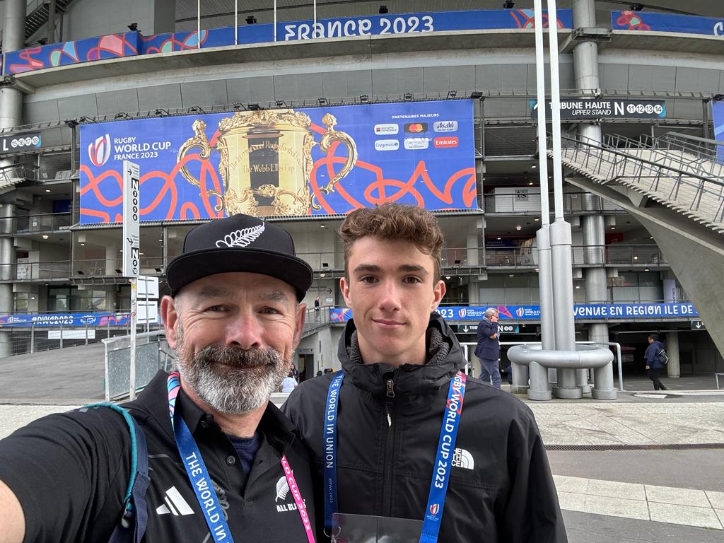 Max Woosey and dad Mark at the Rugby World Cup. Credit: Defender