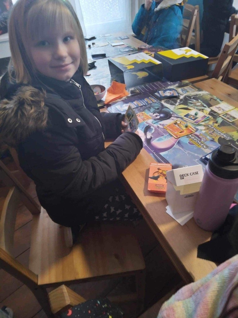 Piper taking part in a Pokemon event