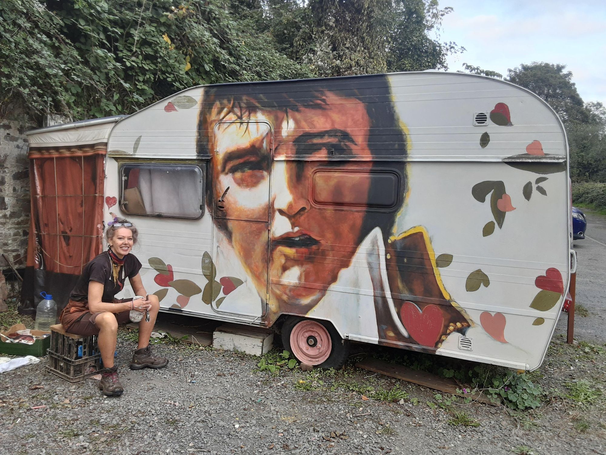 Shan Miller with her caravan, complete with Elvis mural - Credit: Shan Miller