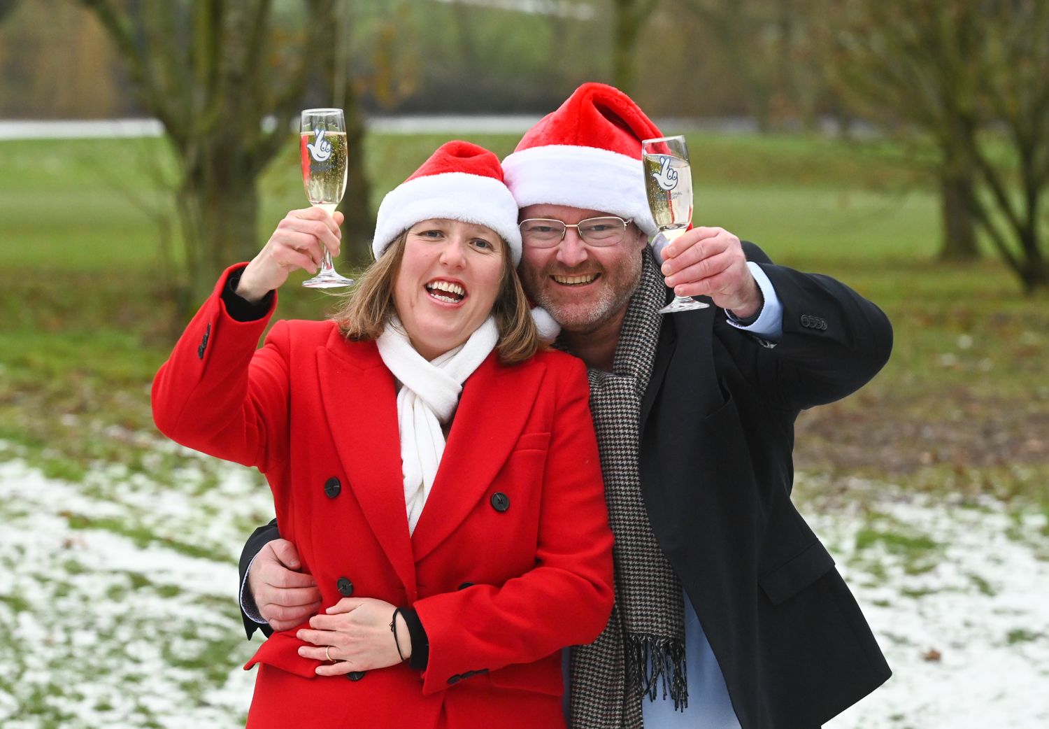 Eleanor Land and Karl Ward celebrate their £1 million EuroMillions win. (National Lottery/ PA)