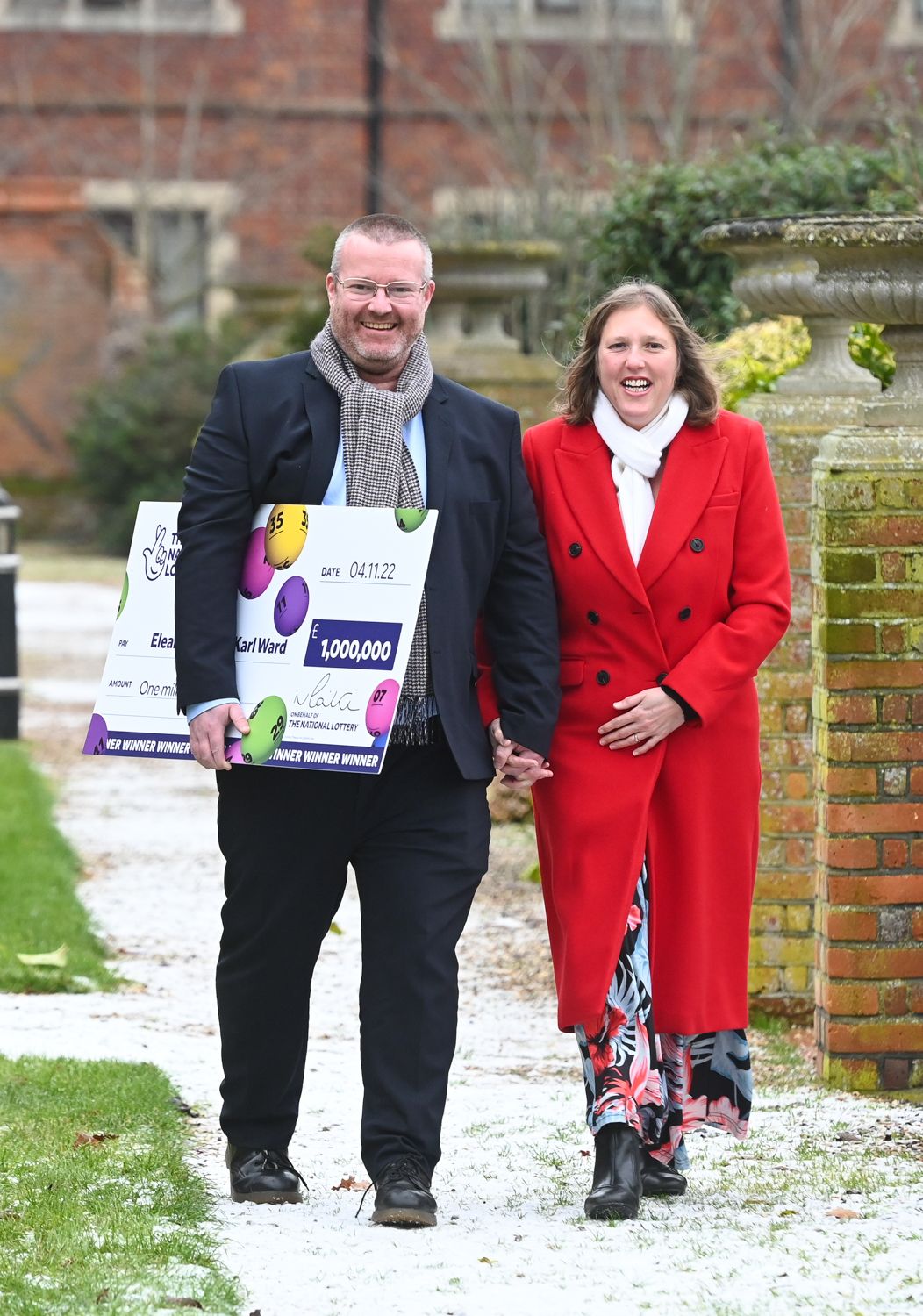 Eleanor Land and Karl Ward celebrate their £1 million EuroMillions win. (National Lottery/ PA)