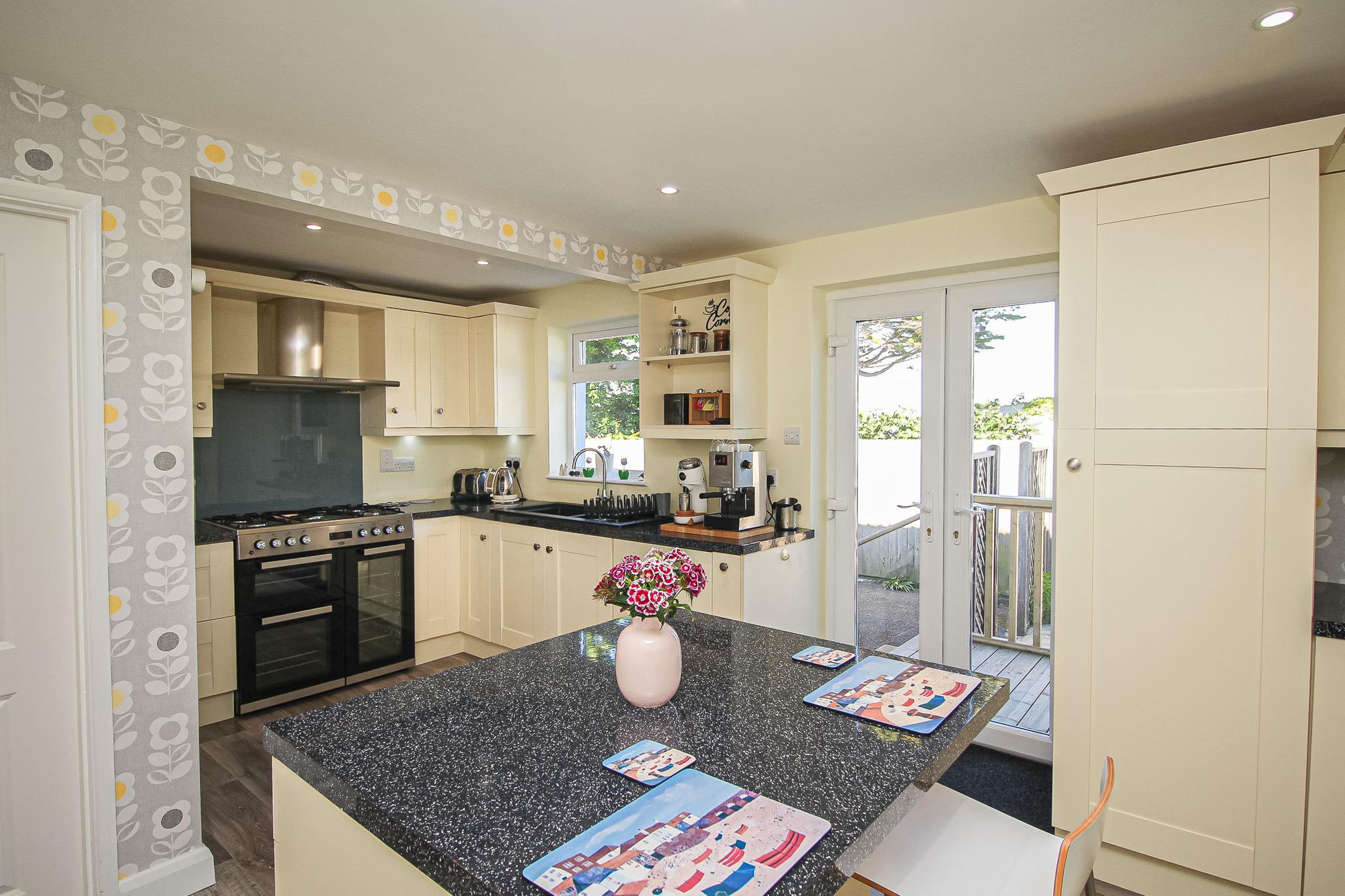 The well-appointed kitche is bright and leads on to the garden. Credit: Brights